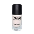 Refect Beauty Yolo French nail polish in a sheer nude shade with a glossy finish in a glass bottle.