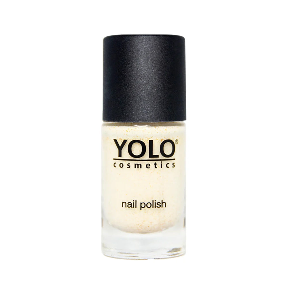 Refect Beauty Yolo glitter nail polish in a clear glass bottle with a black cap, featuring a shimmering gold finish.