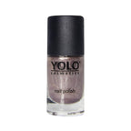 Refect Beauty Yolo glitter nail polish in a shimmering metallic taupe shade in a glass bottle with a black cap.