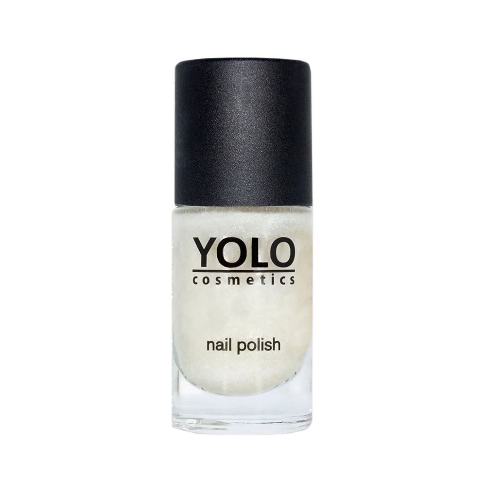 Refect Beauty Yolo glitter nail polish in a clear glass bottle with a black cap, featuring a sparkling finish.