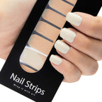 Refect Beauty Yolo glitter nail strips applied to fingers, showing a smooth, sparkling off-white manicure.