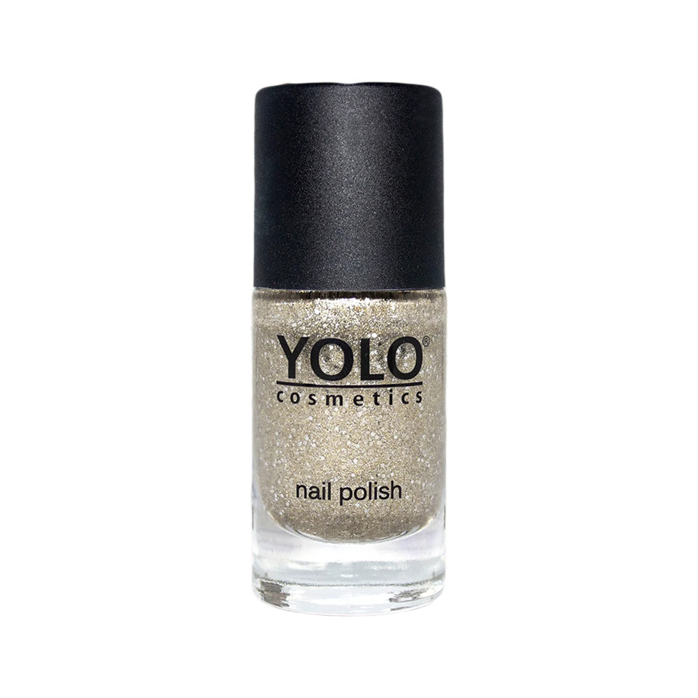 Refect Beauty Yolo glitter nail polish in a shimmering gold tone with a black cap in a glass bottle.
