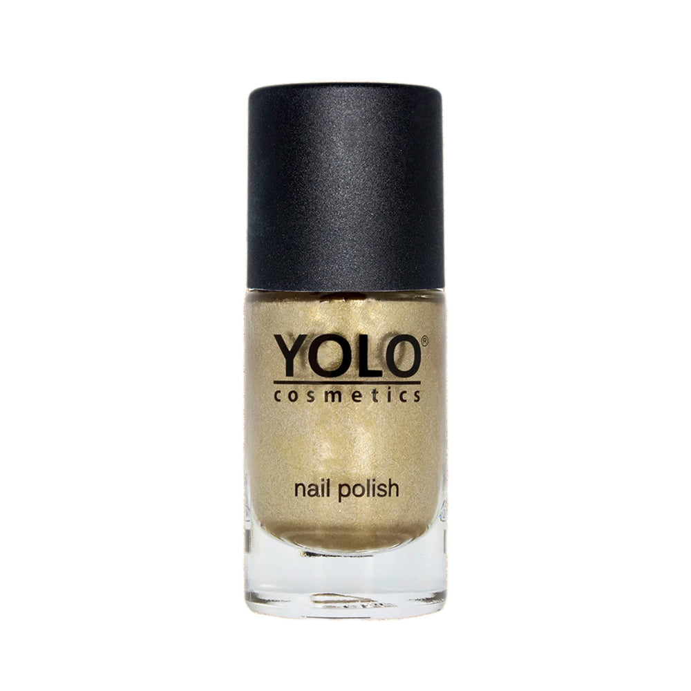Refect Beauty Yolo gold glitter nail polish in a glass bottle with a black cap for a sparkling manicure finish.
