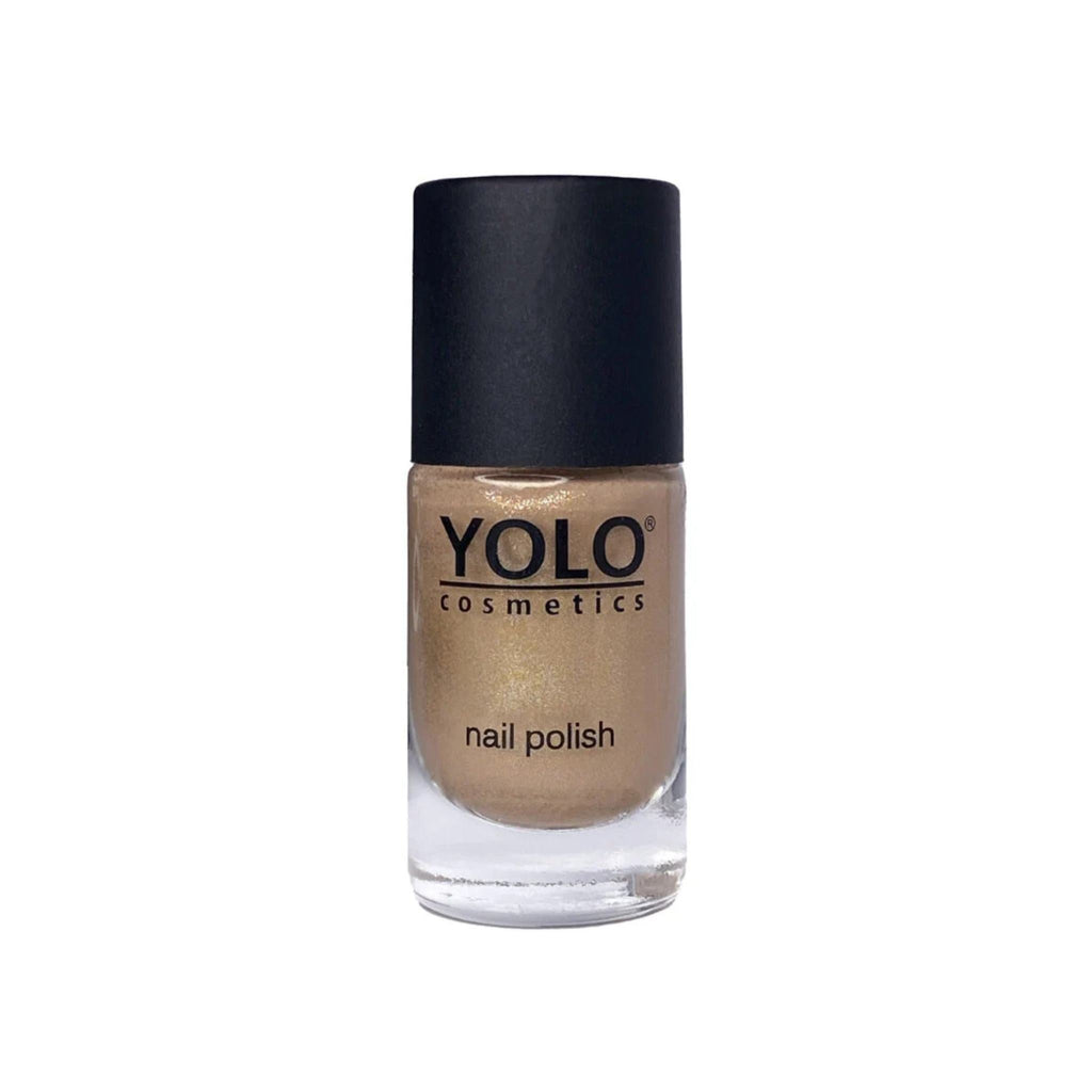 Refect Beauty YOLO nail polish in a shimmering gold shade with a high-gloss finish in a glass bottle