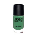 Refect Beauty Yolo Nail Polish in a creamy green shade with a smooth, opaque finish in a glass bottle.