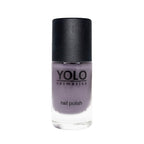 Refect Beauty Yolo Nail Polish in a soft grey creamy shade with a smooth, glossy finish in a glass bottle.