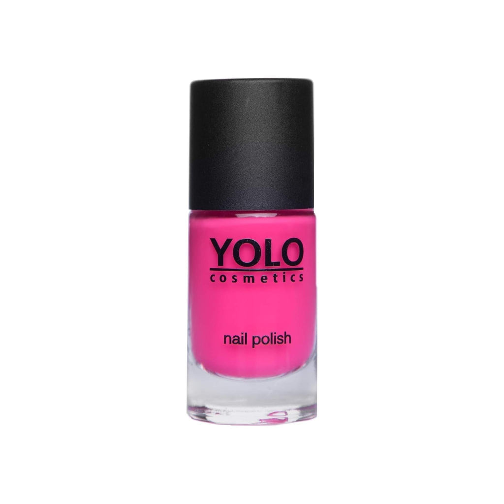 Refect Beauty YOLO nail polish in a vibrant hot pink shade with a high-gloss finish in a glass bottle.