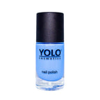 Refect Beauty Yolo light blue shimmer nail polish in a glass bottle with a black cap