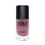 Refect Beauty Yolo Nail Polish in a dusty mauve creamy shade with a black cap in a glass bottle.