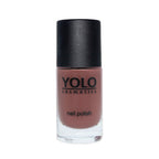 Refect Beauty Yolo creamy nail polish in a dusty rose shade with a smooth, glossy finish in a glass bottle.