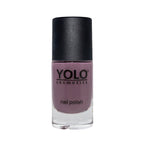 Refect Beauty Yolo creamy mauve nail polish in a glass bottle with a black cap for a smooth glossy finish.