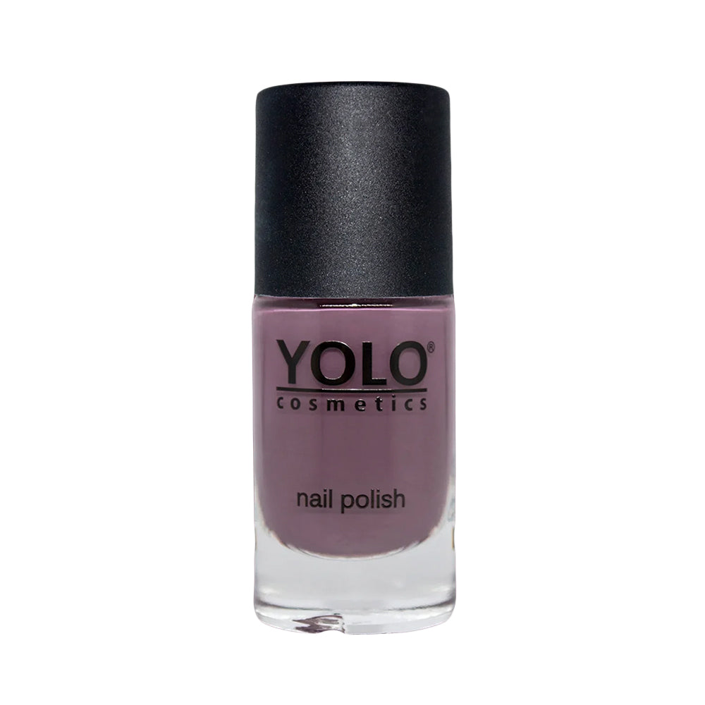 Refect Beauty Yolo creamy mauve nail polish in a glass bottle with a black cap for a smooth glossy finish.