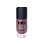 Refect Beauty Yolo nail polish bottle in a shimmering mauve shade with a high-gloss finish and black cap.