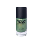 Refect Beauty YOLO nail polish in a shimmering green shade with a high-gloss finish in a glass bottle