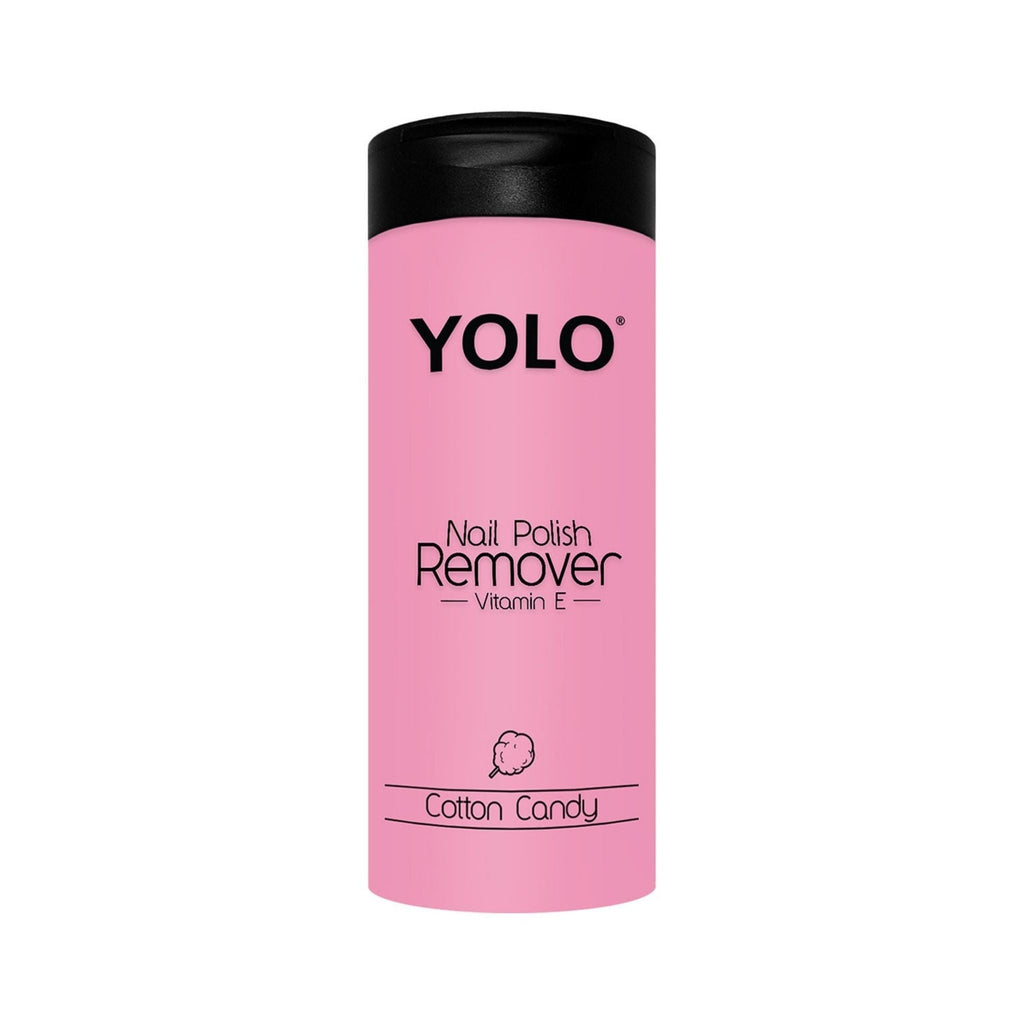 Refect Beauty YOLO nail polish remover in a pink bottle with black cap, scented with cotton candy and Vitamin E.