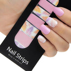 Refect Beauty Yolo nail strips featuring pink solid and tropical palm leaf patterns applied to manicured fingernails