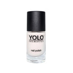 Refect Beauty YOLO nail polish in a soft neutral shade with a high-gloss finish in a clear glass bottle