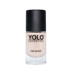 Refect Beauty Yolo nude nail polish in a clear glass bottle with a black cap for a glossy, elegant manicure.