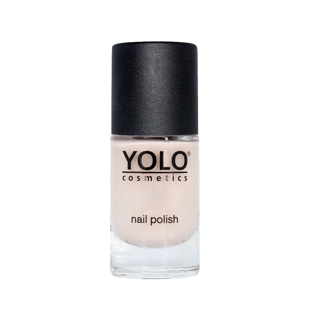 Refect Beauty Yolo nude nail polish in a clear glass bottle with a black cap for a glossy, elegant manicure.