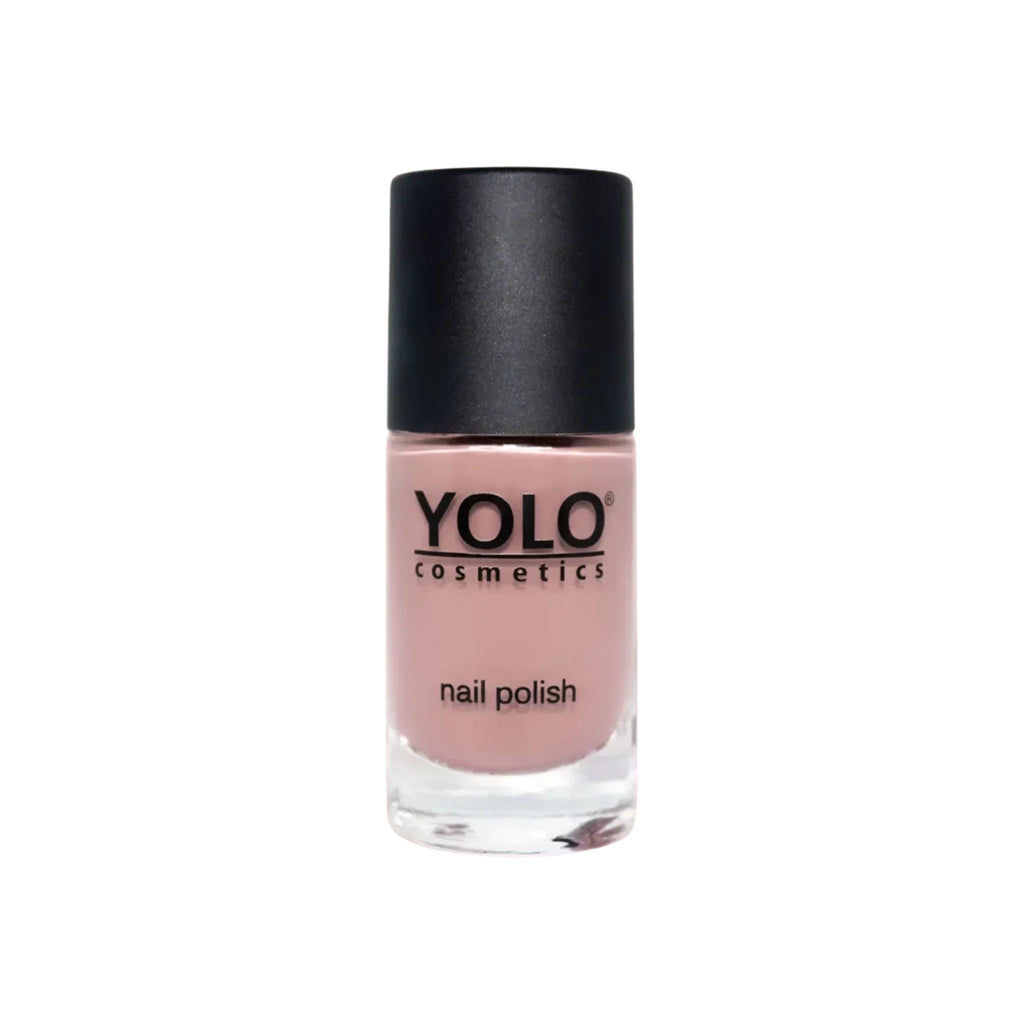 Refect Beauty Yolo nail polish in a soft nude pink shade with a high-gloss finish in a glass bottle.