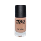 Refect Beauty Yolo nude nail polish bottle with a glossy finish and black cap against a white background