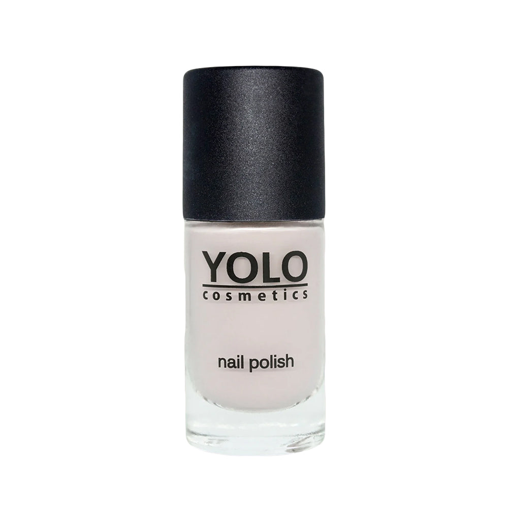 Refect Beauty Yolo nude nail polish in a clear glass bottle with a matte black cap for a glossy, elegant finish.