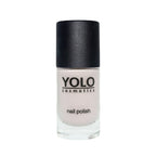 Refect Beauty Yolo nude nail polish in a clear glass bottle with a matte black cap for a glossy, elegant finish.
