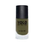 Refect Beauty Yolo Nail Polish Creamy in a deep olive green shade with a smooth, glossy finish in a glass bottle.