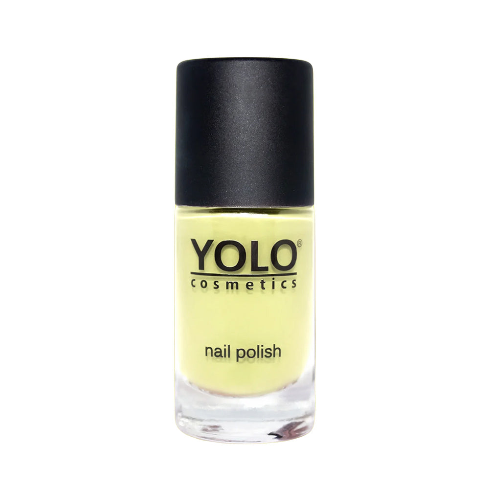 Refect Beauty Yolo creamy nail polish in a pale yellow shade with a smooth glossy finish in a glass bottle.
