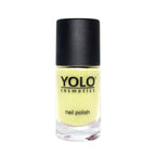 Refect Beauty Yolo creamy nail polish in a pale yellow shade with a smooth glossy finish in a glass bottle.