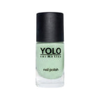 Refect Beauty Yolo pastel mint green nail polish in a glass bottle with a black cap and glossy finish.