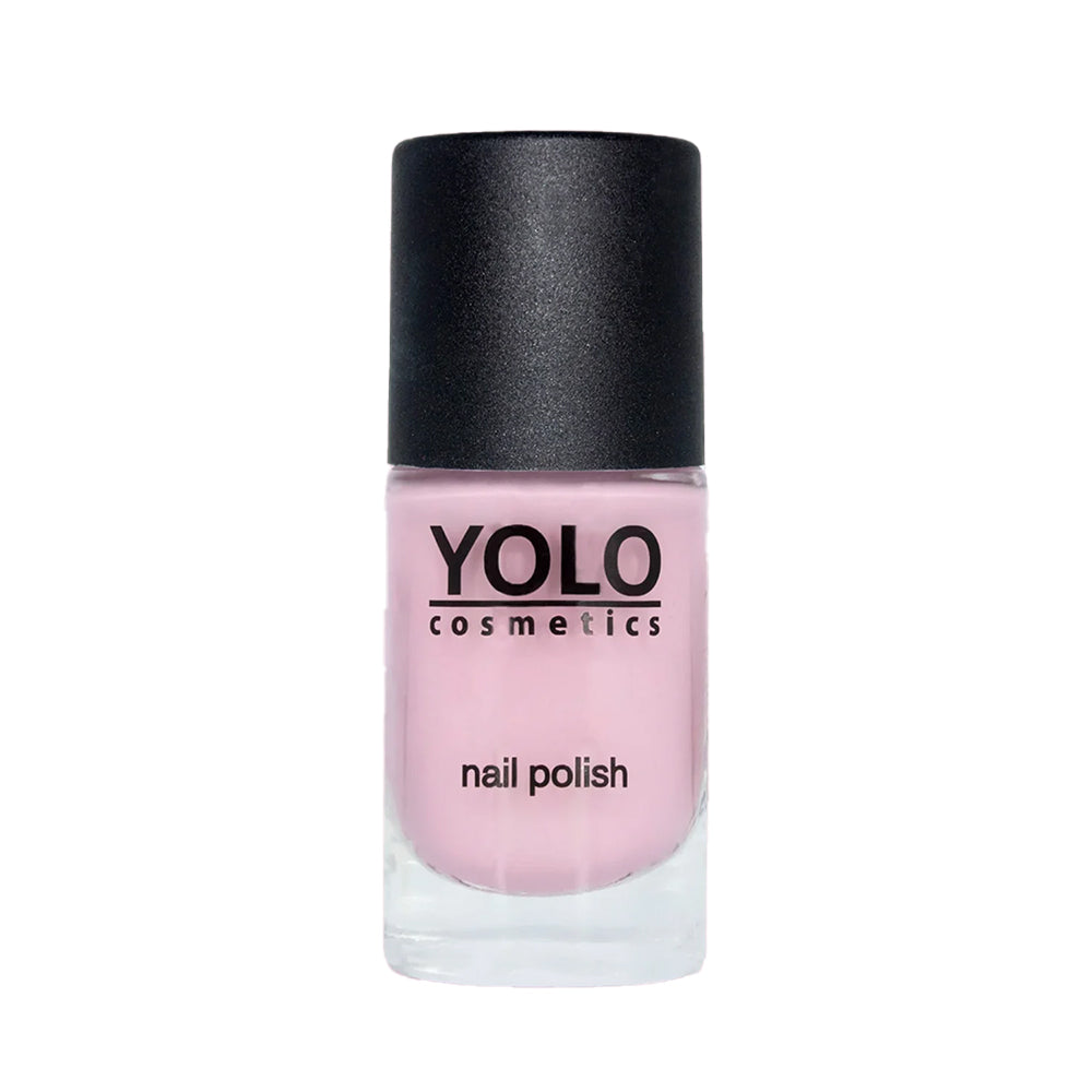 Refect Beauty Yolo pastel pink nail polish in a clear glass bottle with a black cap for a glossy manicure finish.