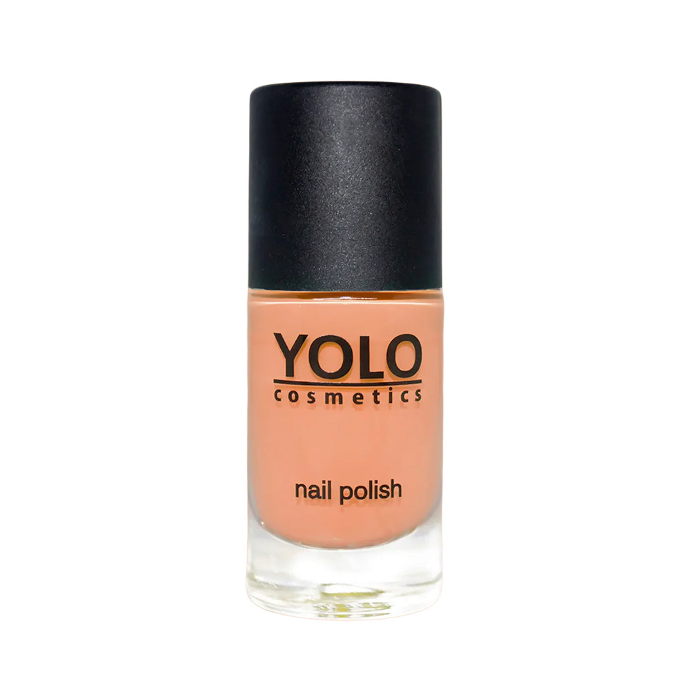Refect Beauty Yolo Nail Polish in a soft peach creamy shade with a black cap in a clear glass bottle.