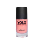 Refect Beauty Yolo nail polish in a soft peach shade with a high-gloss finish in a glass bottle