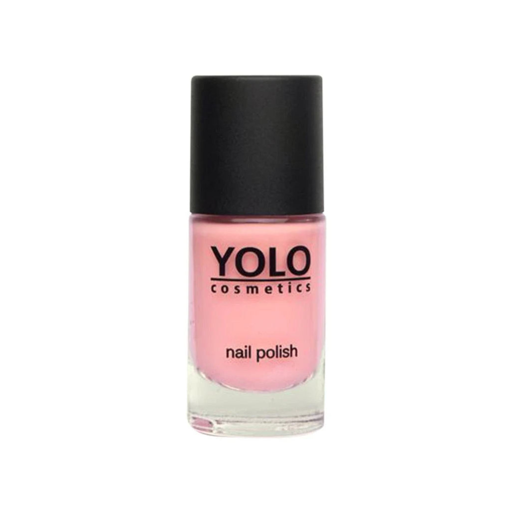 Refect Beauty Yolo nail polish in a soft pink shade with a high-gloss finish in a clear glass bottle