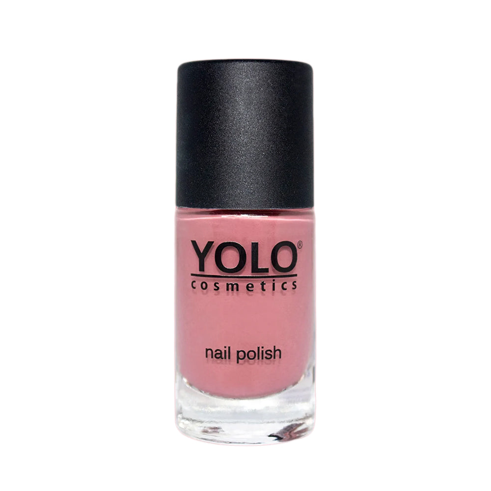 Refect Beauty Yolo Nail Polish in a dusty rose pink shade with a smooth creamy finish in a glass bottle.