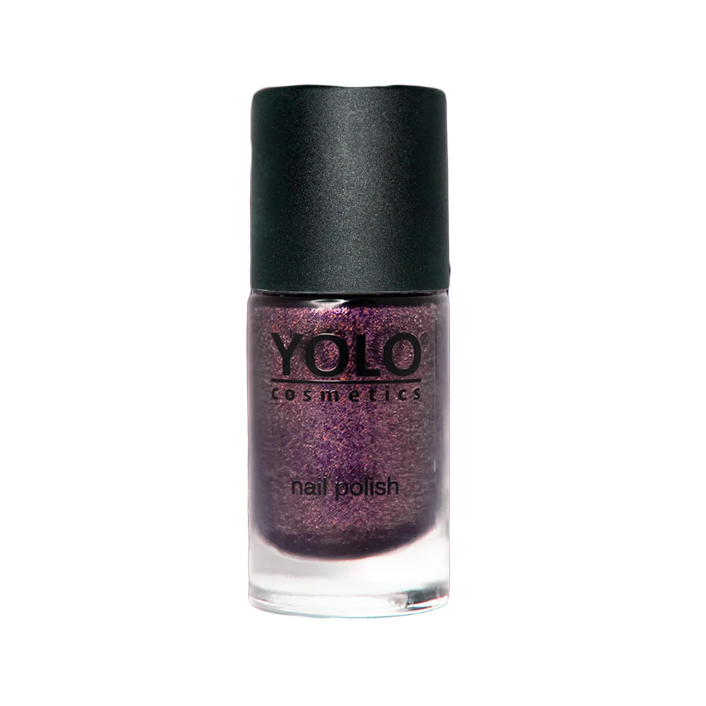 Refect Beauty Yolo glitter nail polish in a deep purple shade with a black cap, perfect for a festive manicure.