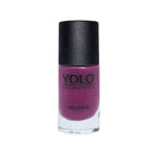 Refect Beauty Yolo nail polish in a vibrant purple shade with a high-gloss finish in a glass bottle