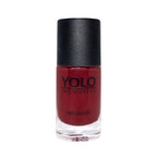 Refect Beauty Yolo creamy red nail polish bottle with a black cap for a smooth glossy manicure finish.