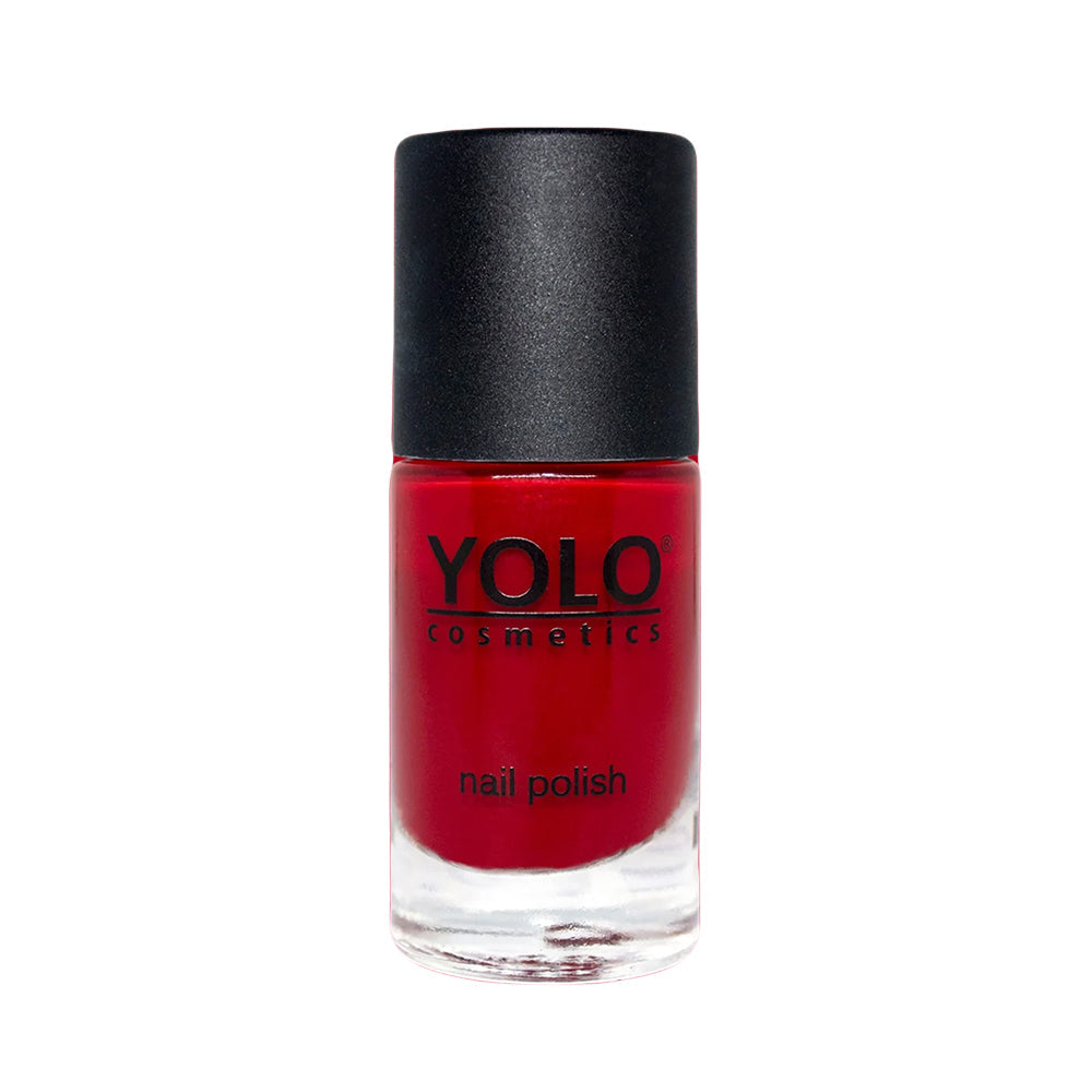 Refect Beauty Yolo Nail Polish in a vibrant creamy red shade with a glossy finish in a glass bottle.