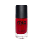 Refect Beauty Yolo Nail Polish in a vibrant creamy red shade with a glossy finish in a glass bottle.