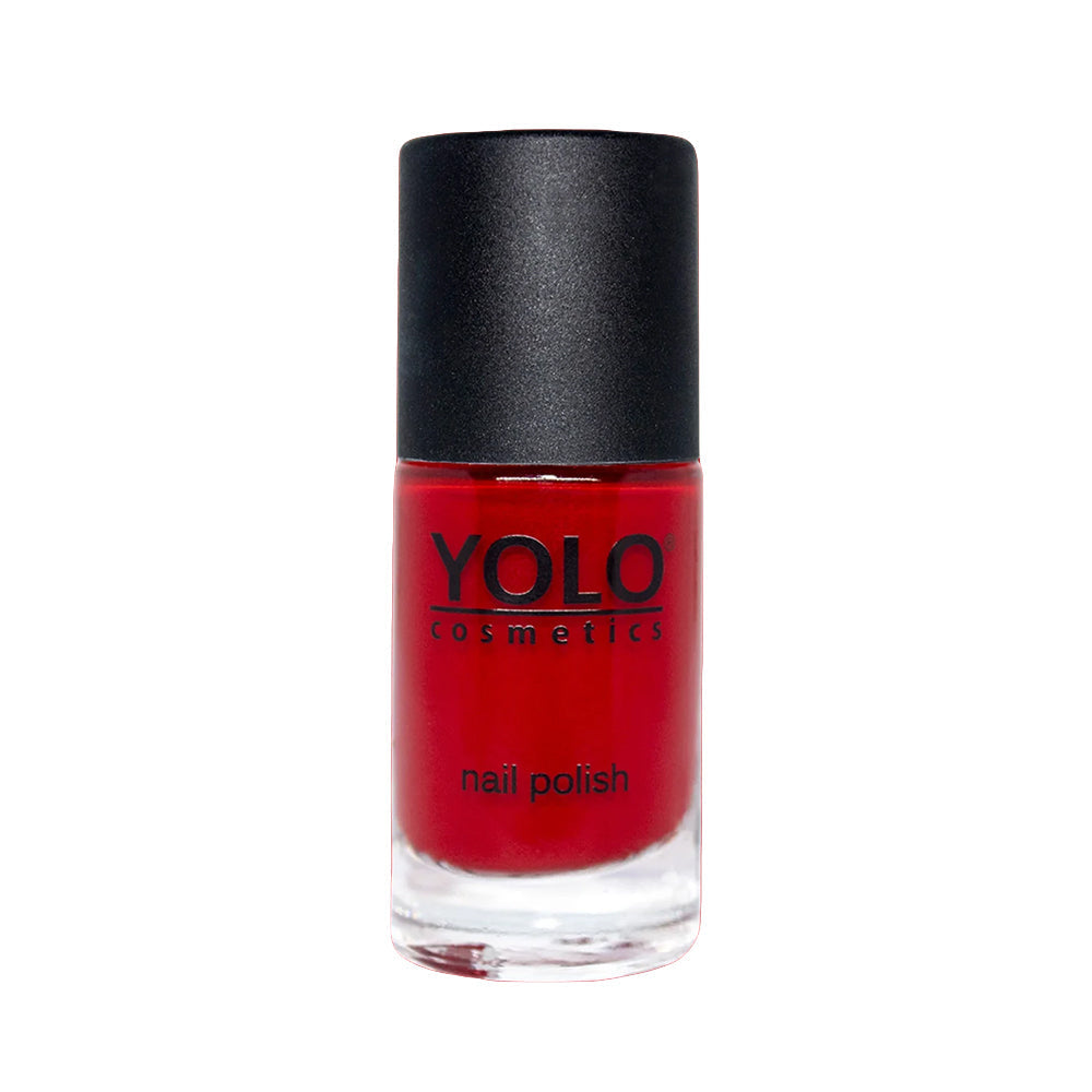 Refect Beauty Yolo creamy red nail polish in a glass bottle with a black cap for a glossy, opaque finish.