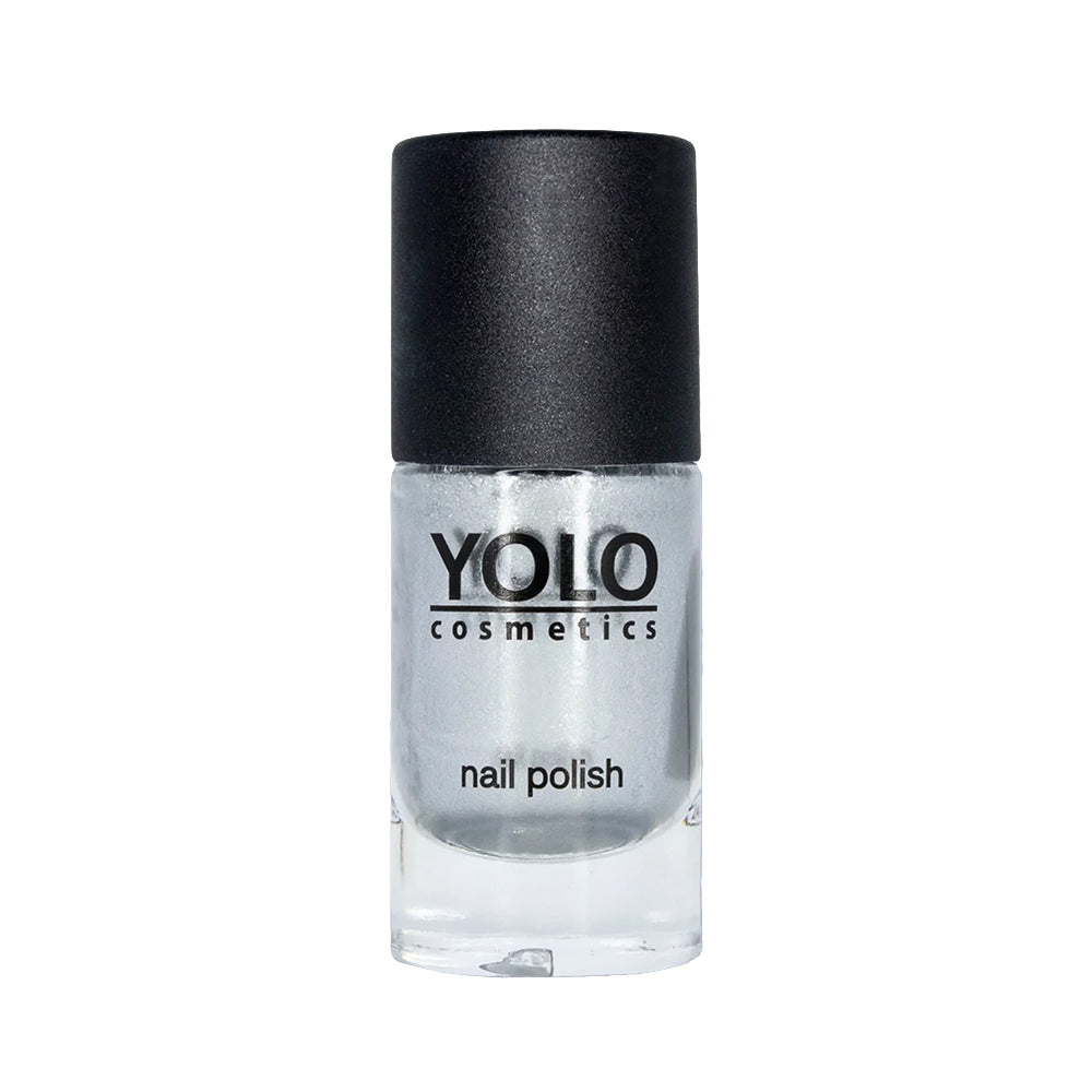 Refect Beauty Yolo silver glitter nail polish in a clear glass bottle with a black cap.