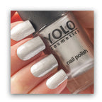 Refect Beauty Yolo mirror nail polish in a metallic silver shade with a high-shine reflective finish on fingernails.