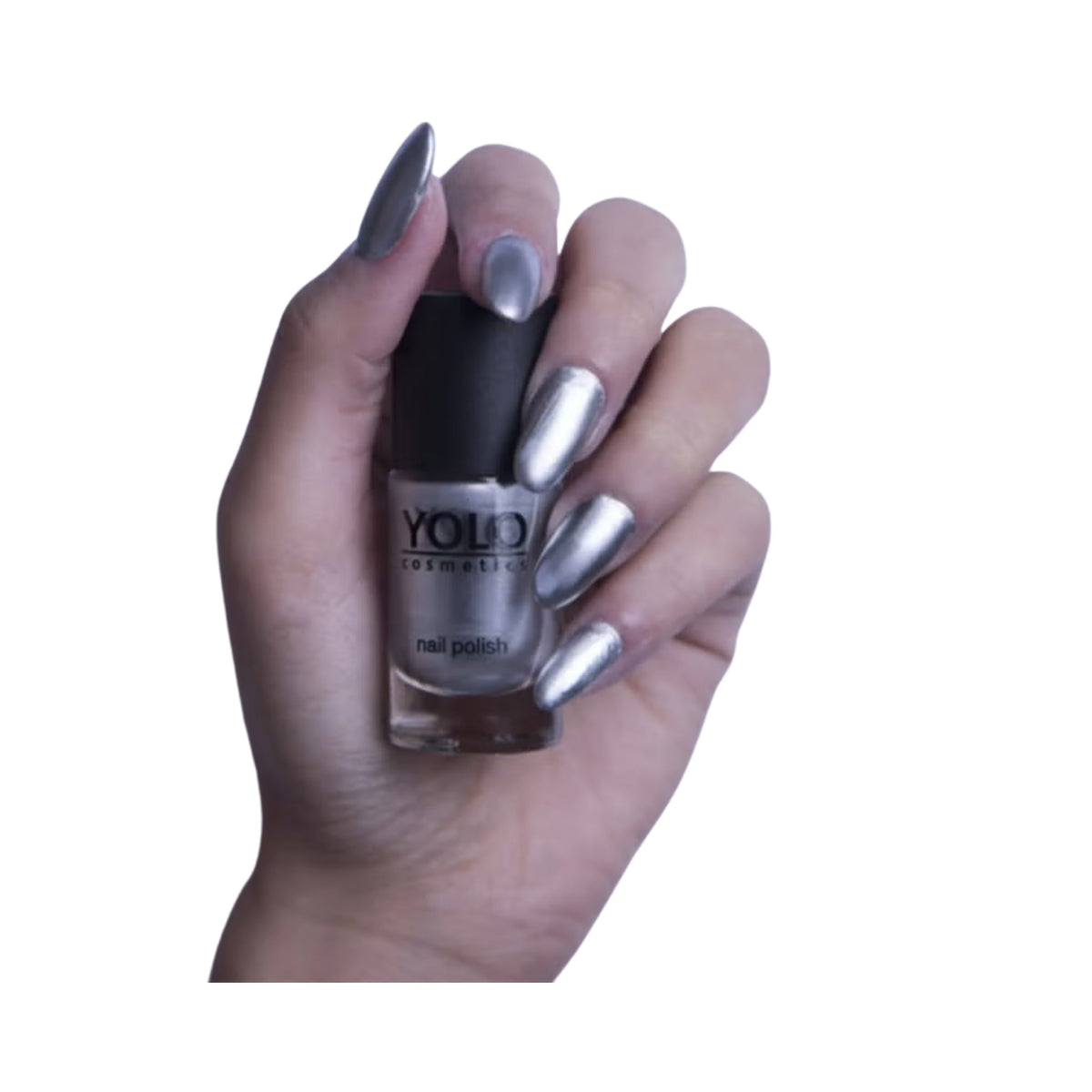 Refect Beauty Yolo mirror nail polish in metallic silver applied on long nails held by a hand