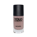 Refect Beauty Yolo creamy taupe nail polish in a glass bottle with a black cap for a smooth glossy finish.