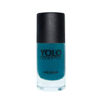 Refect Beauty Yolo Nail Polish in a deep teal shade with a smooth creamy finish in a glass bottle.