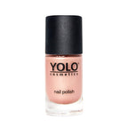 Refect Beauty Yolo Velvet nail polish in a soft peach shade with a smooth matte finish in a glass bottle