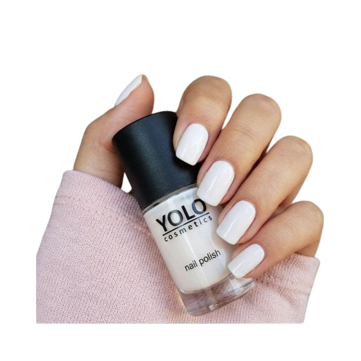Refect Beauty Yolo white nail polish bottle held in a hand, showing a smooth, glossy French manicure finish.