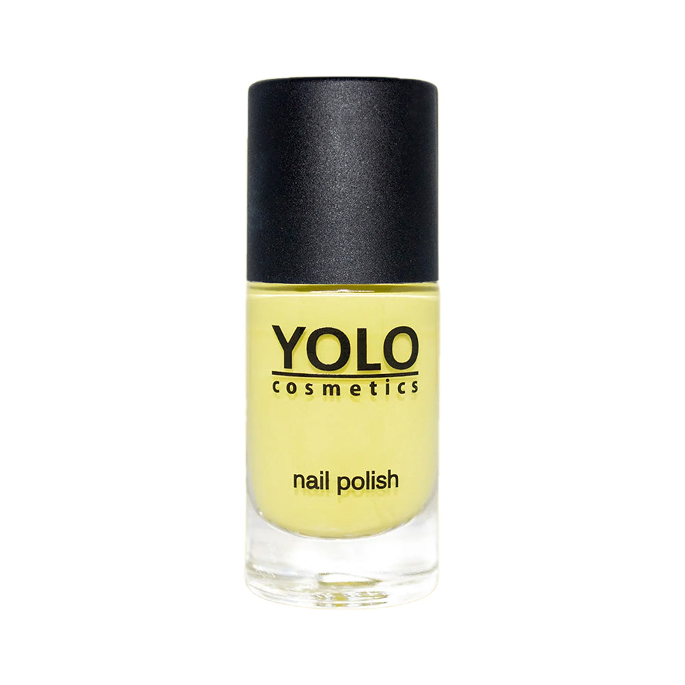 Refect Beauty Yolo creamy yellow nail polish in a glass bottle with a black cap for a smooth glossy finish.